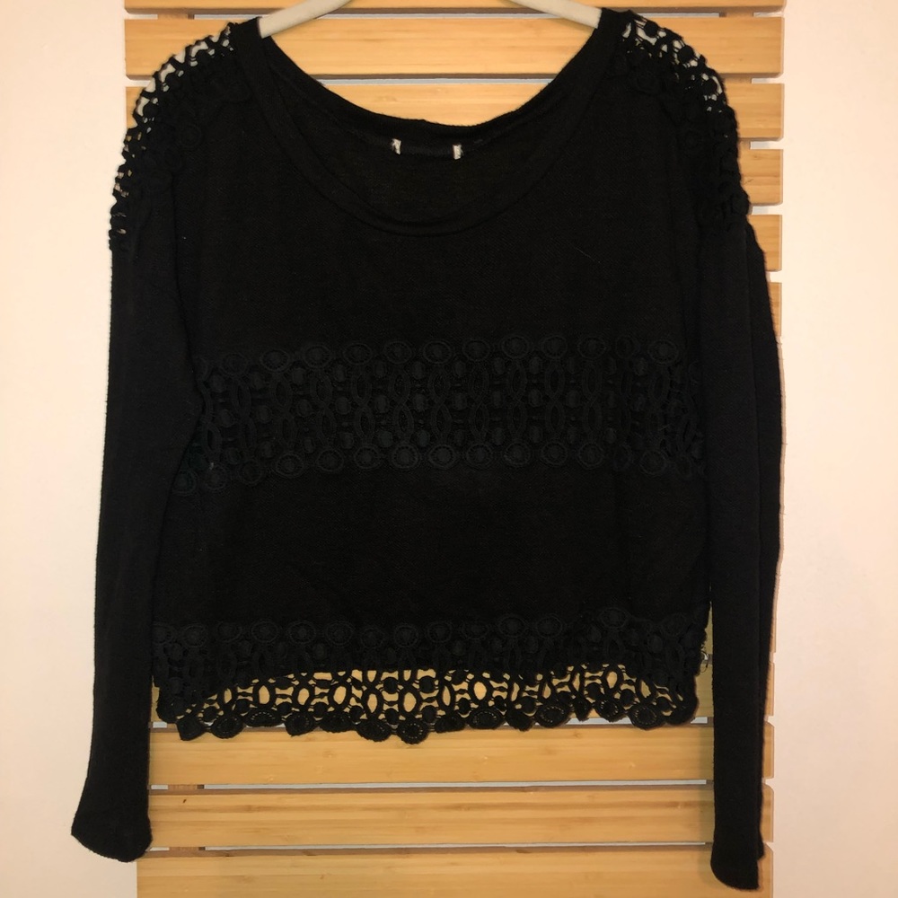 Black cropped sweater.